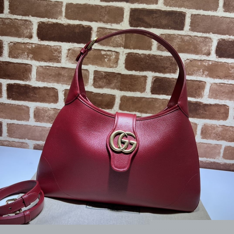 G*u*i top handle bags